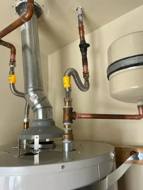 Water heater installation and plumbing repair in Willow Brook